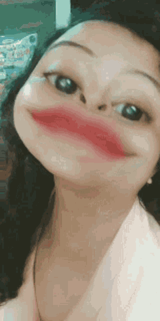 a close up of a woman making a funny face with her mouth open