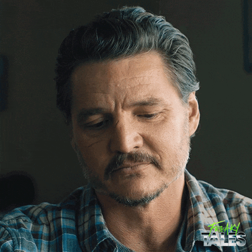 a man with a beard and a plaid shirt is looking at the camera with a green logo that says tales