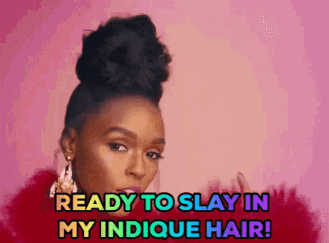 a woman with a bun is ready to slay in her indicque hair .