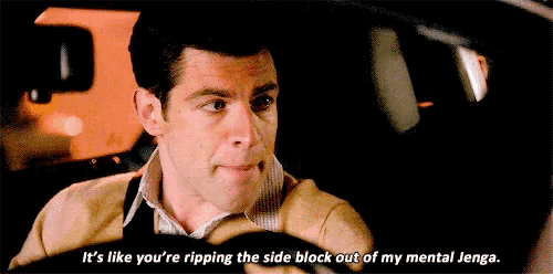 a man is driving a car and talking about ripping the side block out of a mental jenga .