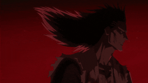 a close up of a red background with a black feather in the foreground