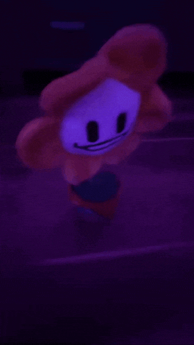 a stuffed animal with a smiley face on it