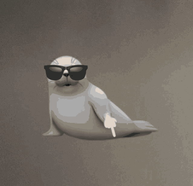 a seal wearing sunglasses is pointing at the camera