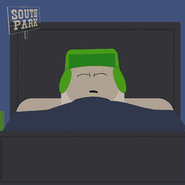 a cartoon character laying in bed with a sign that says south park