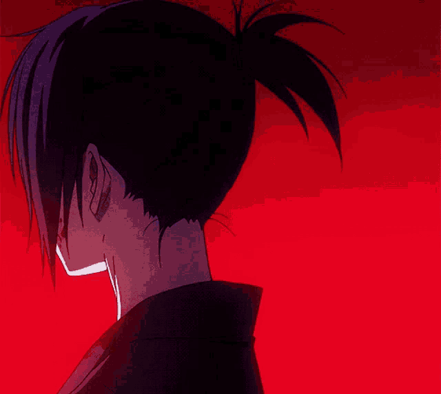 a close up of a person 's face with a ponytail
