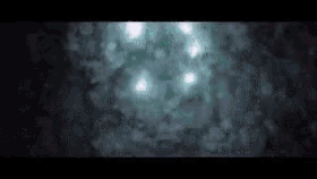 a blurred image of a person swimming in the water