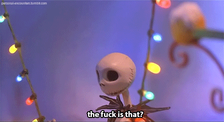 a nightmare before christmas scene with a skeleton holding a string of lights and the words " the fuck is that "