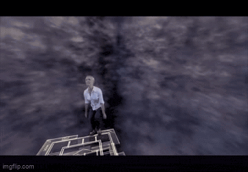a man in a white shirt is jumping in the air with his arms in the air ..