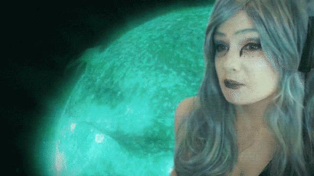 a woman with long blue hair is standing in front of a blue planet