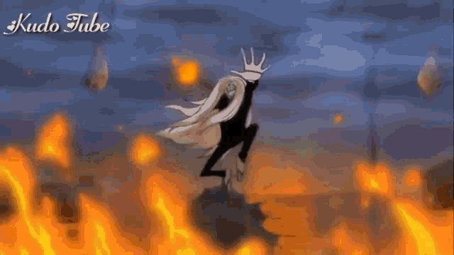 a person is standing in front of a large explosion with the words kudo tube in the corner .