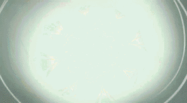 a close up of a light shining through a circle on a dark background .