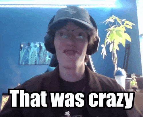 a man wearing a hat and headphones says " that was crazy "