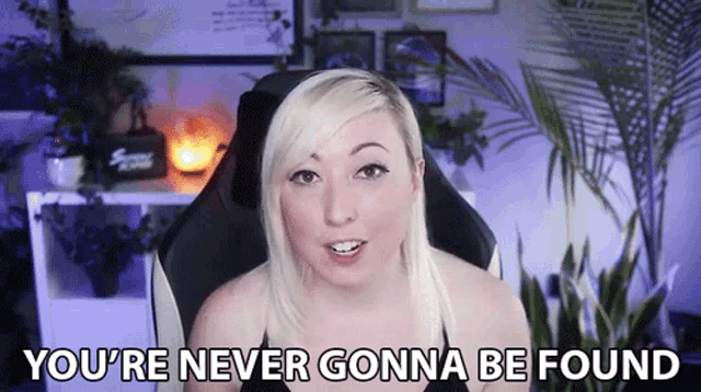 a woman is sitting in a chair and saying you 're never gonna be found .