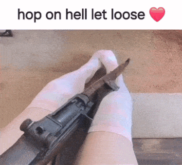 a person holding a gun with the words hop on hell let loose in the corner