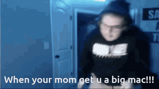 a blurry picture of a man with the words " when your mom get u a big mac "