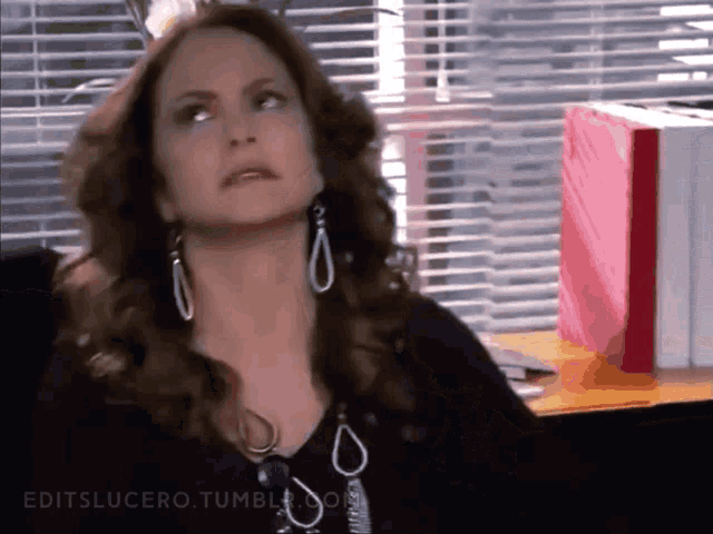 a woman 's face is shown with the words editslucero.tumblr.com visible