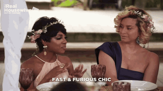 two women are sitting at a table with the words fast & furious chic written on the bottom