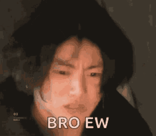 a close up of a person 's face with the words bro ew written next to it .