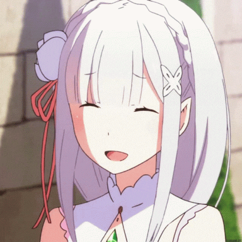 a girl with a flower in her hair is smiling