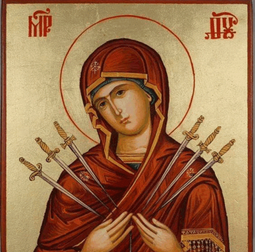 a religious icon of a woman holding swords with the letter mp on the bottom