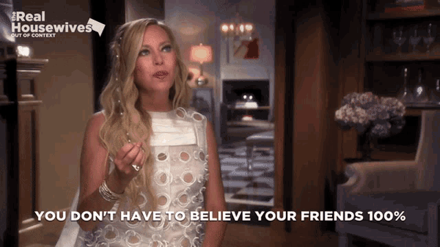 a woman in a white dress says you don 't have to believe your friends 100 %