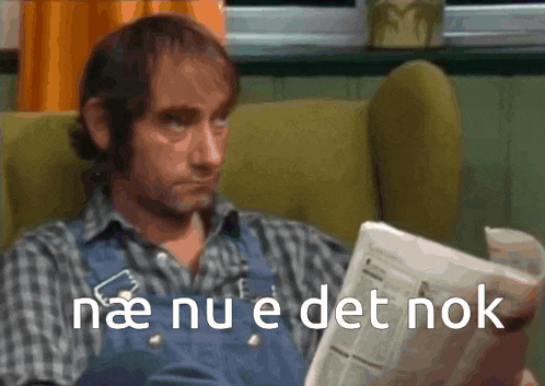 a man sitting in a chair reading a newspaper with the words nae nu e det nok on the bottom