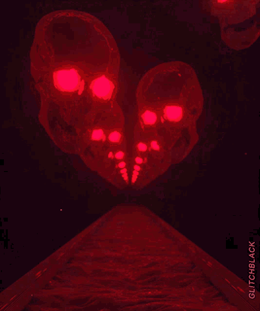 a picture of skulls with red eyes and the words glitchblack