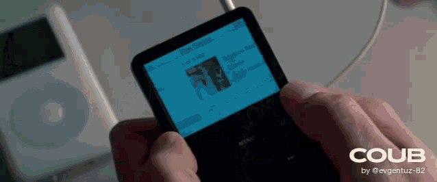 a person is holding a ipod with a blue screen