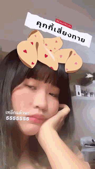 a girl wearing a beautyium filter with a cookie in her hair