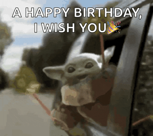 a baby yoda is sticking its head out of a car window and wishing a happy birthday