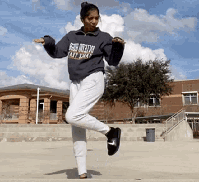 a person wearing a sweatshirt that says east texas