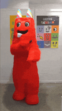 a red monster mascot is standing in front of a poster that says garten of banban