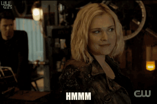 a woman in a leather jacket says i approve in front of a man