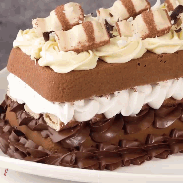 a white plate with a cake on it with the number 3 on it