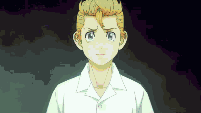 a close up of a person 's face with a white shirt