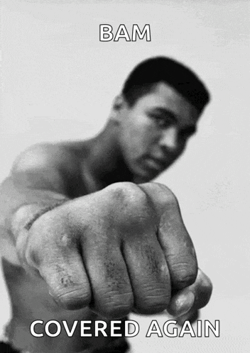 a man without a shirt is pointing his fist at the camera with the words bam covered again above him