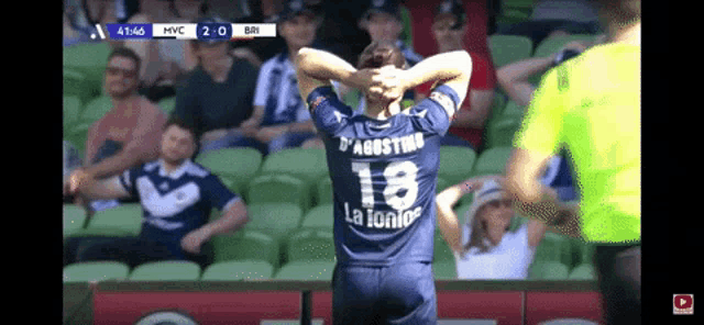 a soccer player with the number 18 on their jersey