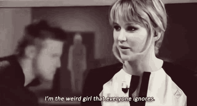 a woman says i 'm the weird girl that everyone ignores in a black and white photo