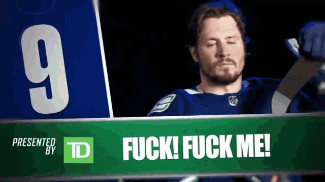a hockey player stands in front of a sign that says " fuck ! fuck me "