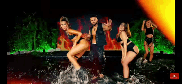 a man and three women are dancing in a pool with a subscribe button in the corner .