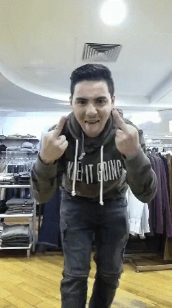 Guy With Gray Sweater Doing The Dirty Finger GIF - Guy With Gray Sweater Doing The Dirty Finger Temponoskee GIFs