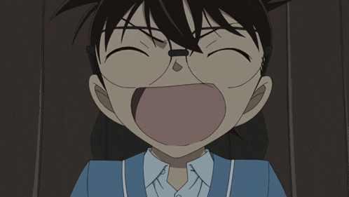 a close up of a cartoon character with glasses making a funny face