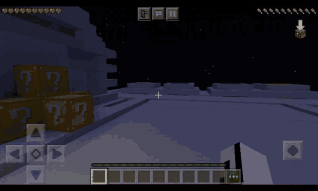 a screenshot of a minecraft game shows a stack of gold boxes with question marks on them