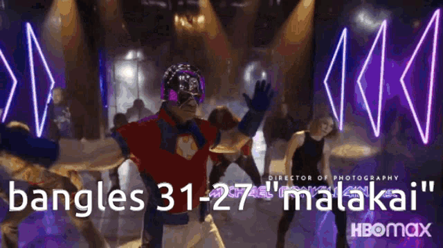 a man in a superhero costume is dancing in front of a neon sign that says bangles 31- 27 matakail