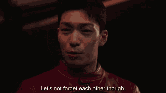 a man in a red leather jacket says " let 's not forget each other though "