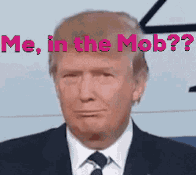 a man in a suit and tie with the words me in the mob above him