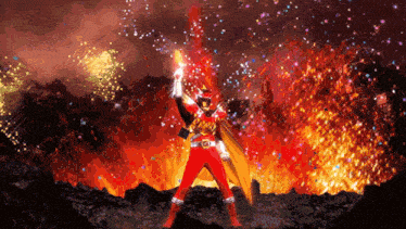 a red power ranger is standing in front of a fire explosion