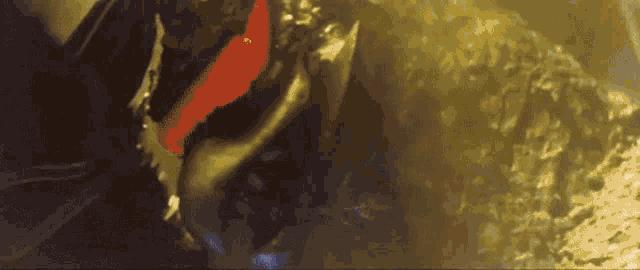 a close up of a person 's face with a red stripe on it .