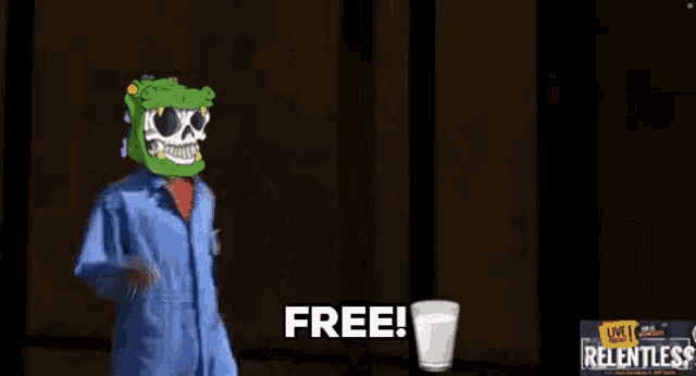 a man in a blue jumpsuit with a green skull on his head says free