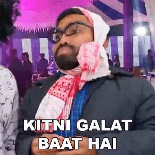 a man is wearing glasses and a scarf around his head and says kitni galat baat hai